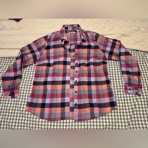 Orvis Perfect Flannel Shirt in a pink and blue plaid pattern.